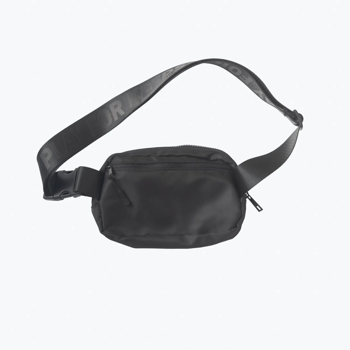 This image displays a black crossbody day bag from Tater Baseball, featuring a sleek design with the brand&#39;s logo on the strap, conveying a stylish and practical accessory for everyday use.
